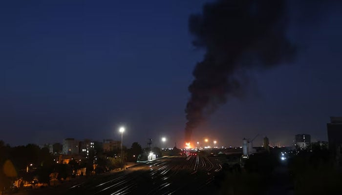 Fire of Israeli attack on Tehran Oil Refinery is seen following the Israeli strikes on Iran, in south of Tehran, Iran, June 15, 2025. — Reuters