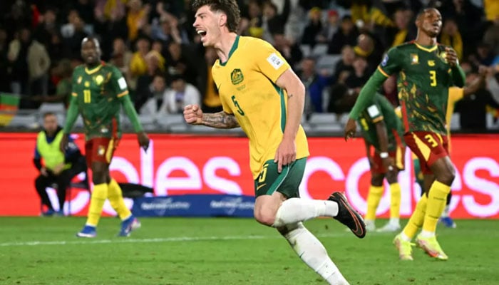 Australia’s Jordan Bos (centre) celebrates after scoring the only goal against Cameroon in Sydney. — AFP/File