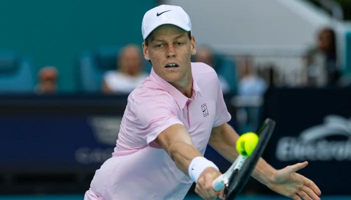 Jannik Sinner of Italy hits a shot against Frances Tiafoe of the United States in the quarter finals of the men’s singles at the Miami Open at Hard Rock Stadium on Mar 26, 2026. — Reuters
