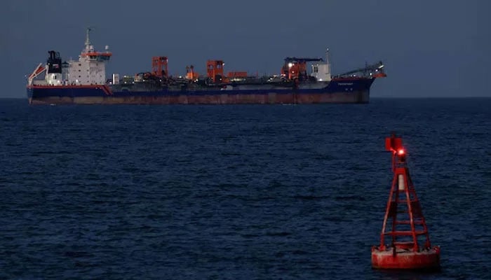 Rotterdam hopper dredger vessel operated by Van Oord sits anchored in Muscat, Oman, amid the US-Israeli conflict with Iran, as Iran vows to close the Strait of Hormuz, March 9, 2026. — Reuters