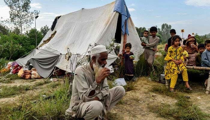 This representational image shows displaced people taking refuge in the Khyber Pakhtunkhwa. — AFP/File