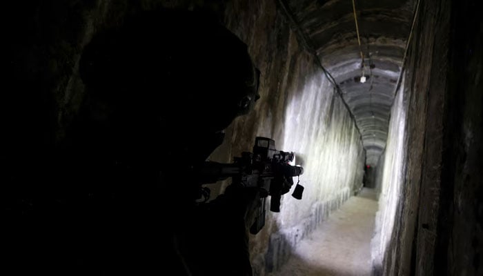 An Israeli soldier secures a tunnel underneath Al Shifa Hospital in Gaza City, amid the ongoing ground operation of the Israeli army against Palestinian Islamist group Hamas, in the northern Gaza Strip, November 22, 2023. — Reuters