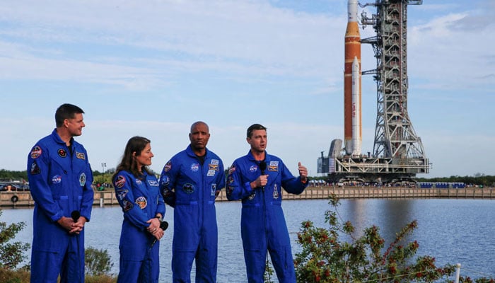 Artemis II missions Commander Reid Wiseman speaks next to pilot Victor Glover, mission specialists Christina Koch and Jeremy Hansen during the rollout of NASAs next-generation moon rocket, the Space Launch System (SLS) rocket with the Orion crew capsule, to the launch pad at the Kennedy Space Center in Cape Canaveral, Florida. — Reuters
