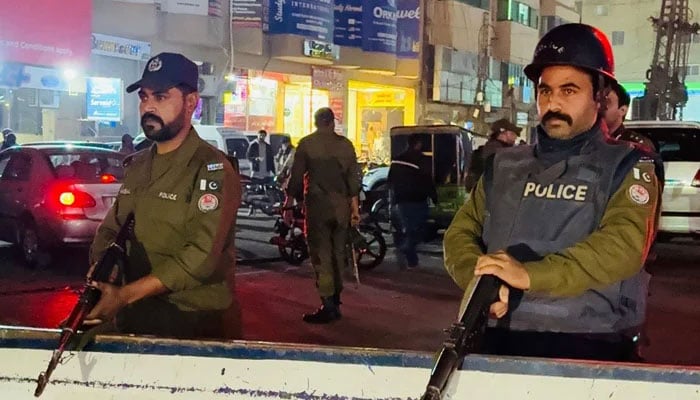 Representational image of the Punjab police personnel standing guard on a road on November 15, 2025. — Facebook@DIGOpsLahore