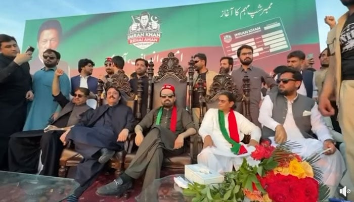 Khyber Pakhtunkhwa (KP) Chief Minister (CM) Muhammad Sohail Afridi is seen sitting on a stage along with other PTI leaders on March 27, 2026. — Facebook@KPChiefMinister/Screengrab
