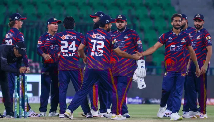 Karachi Kings Hasan Ali (third from right) celebrates taking a wicket with teammates during their PSL 11 match against Quetta Gladiators at the Gaddafi Stadium in Lahore on March 27, 2026. — PSL