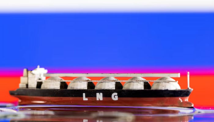 Model of LNG tanker is seen in front of Russias flag in this illustration taken May 19, 2022.—Reuters