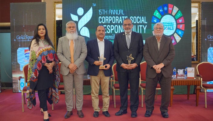 Thar Foundation officials posing with awards at the 15th Annual Corporate Social Responsibility Summit & Awards 2026, March 27, 2026. —Facebook@TharFoundationSECMC
