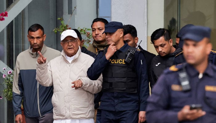 Former Nepal Prime Minister KP Sharma Oli is detained by the police in Kathmandu on Saturday. —Reuters