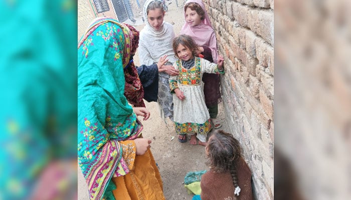 Officials interact with children during the No Child Left Behind campaign in the federal capital on March 29, 2026. — Facebook@mofept