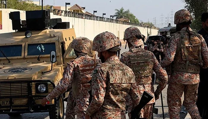 Sindh Rangers personnel standing on the road in Karachi on March 1, 2026. — Reuters