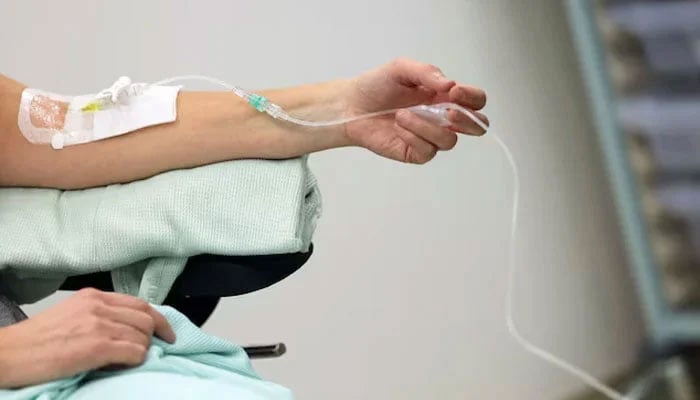 A cancer patient receives a tracer injection. — Reuters/File