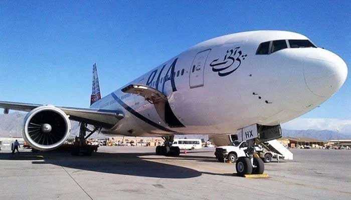 A PIA aircraft is parked on the tarmac at Islamabad Airport. —AFP/File