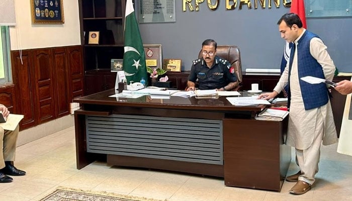 Regional Police Officer (RPO) Bannu, Sajjad Khan is seen busy at his RPO Bannu office — Facebook@Sajjad Khan/File