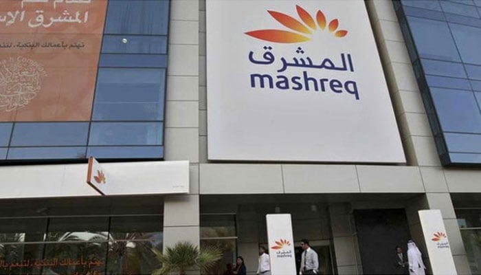People walk out of a branch of Mashreq bank at Dubai Internet City on February 5, 2012. — Reuters/File