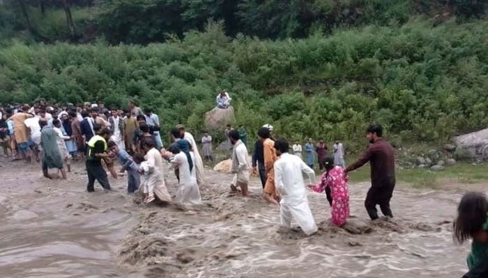 People move to safe locations amid heavy rains in Khyber Pakhtunkhwa on August 15, 2025. — X/@GovernmentKP