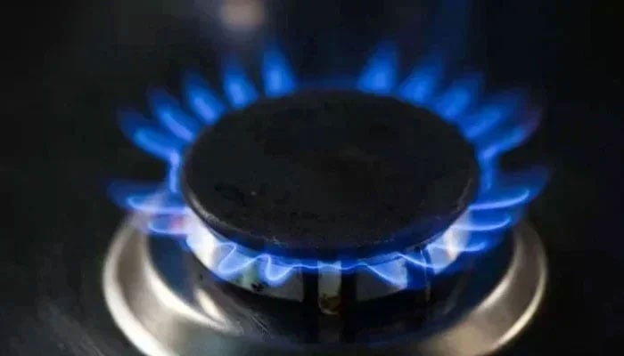 The representational image shows the flames of a lit burner of a gas stove. — AFP/File