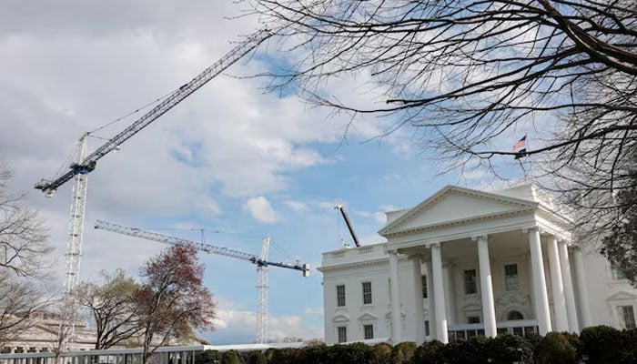 Construction cranes work on White House East Wing renovations in Washington, DC, US, March 17, 2026.—Reuters