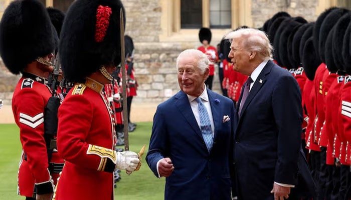 US President Donald Trump and Britains King Charles inspect the Guard of Honour as they attend a welcome ceremony during Trumps state visit, at Windsor Castle, in Windsor, Britain, September 17, 2025.—Reuters