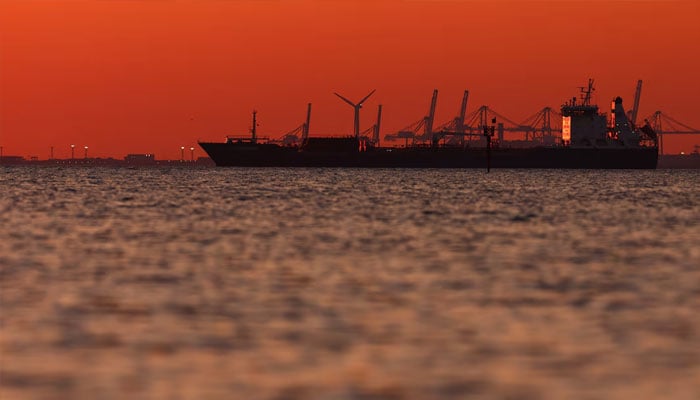 The silhouette of an oil and chemical tanker off the Gulf of Fos-sur-Mer at sunset, in Martigues, France, March 20, 2026. —Reuters