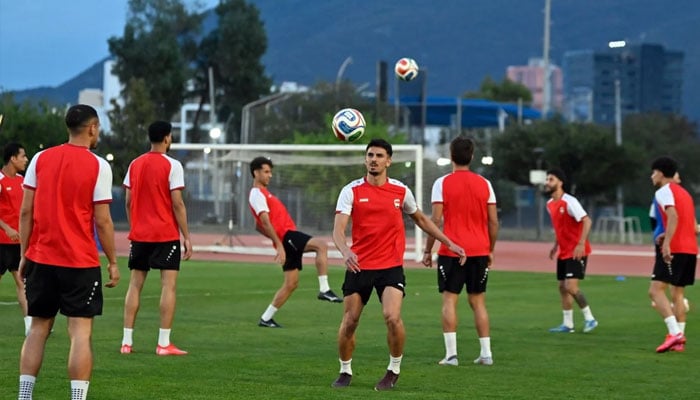 Iraq football players during practice. —AFP/File