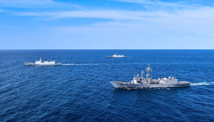 The image shows the Pakistan Navy and Chinese Navy busy in the Exercise Sea Guardian IV on April 1, 2026. — Facebook@DgprNavy