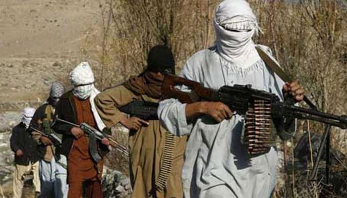 This undated photo shows Taliban fighters posing with weapons in an undisclosed location in Nangarhar province. — Reuters/File