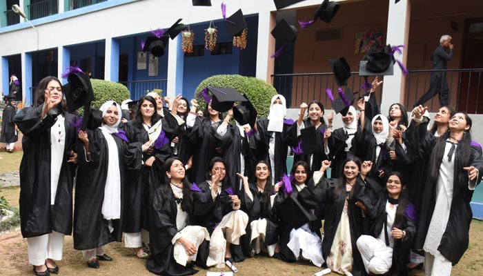 Students throwing their caps after the 23rd Convocation of Model College for Girls G-10/4, in the Federal Capital on April 2, 2026. — Online