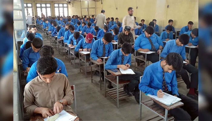 Students of the matric class are solving a paper in an examination centre in Peshawar on April 8, 2025. — PPI