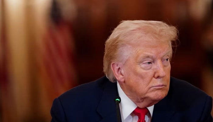 US President Donald Trump looks on during a round table on collegiate sports in the White House in Washington, DC, March 6, 2026.—Reuters