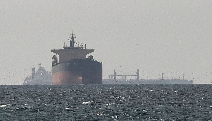 Cargo ships in the Gulf, near the Strait of Hormuz, as seen from northern Ras al-Khaimah, near the border with Oman’s Musandam governance, amid the US-Israeli conflict with Iran, in United Arab Emirates, March 11, 2026. — Reuters