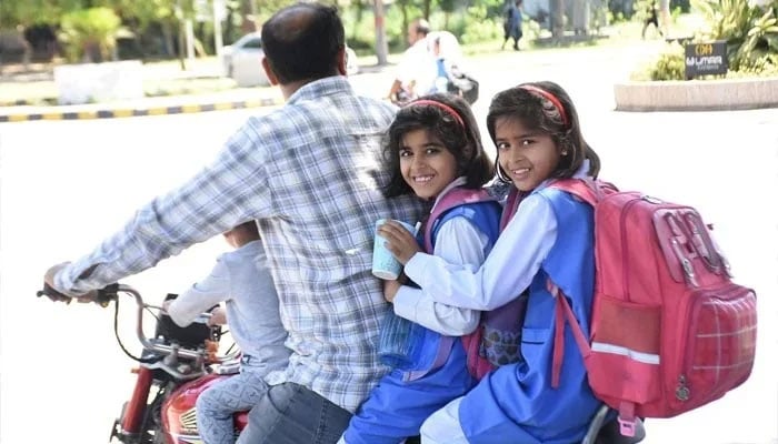 Schoolgirls are leaving for their homes after school in Islamabad on May 10, 2023. — Online