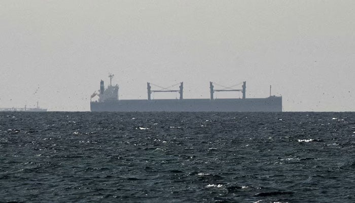 A cargo ship in the Gulf, near the Strait of Hormuz, as seen from northern Ras al-Khaimah, near the border with Oman’s Musandam governance, amid the US-Israeli conflict with Iran, in United Arab Emirates, March 11, 2026. — Reuters