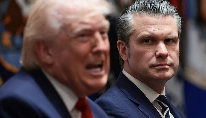 US President Donald Trump speaks next to Defense Secretary Pete Hegseth during a cabinet meeting at the White House in Washington, D.C., US, March 26, 2026. — Reuters