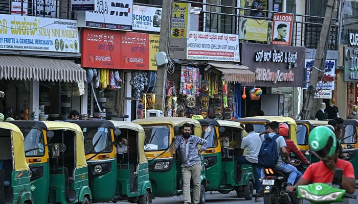 Auto-rickshaws queue to refuel in Bengaluru, on April 1, 2026. —AFP