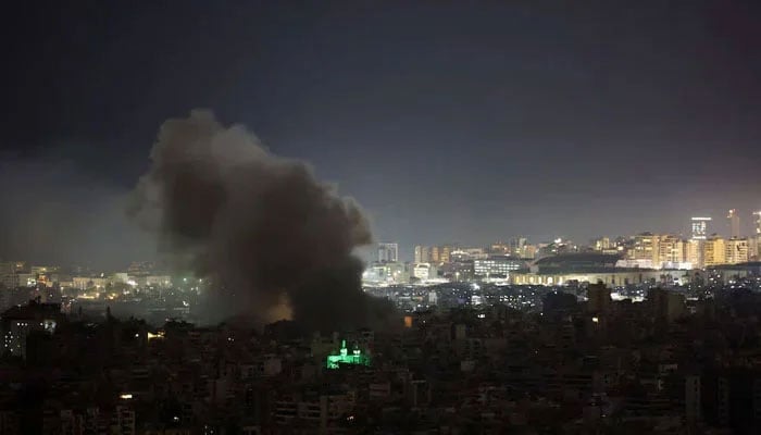 Plumes of smoke rise following Israeli strikes on Beiruts southern suburbs, after an escalation between Hezbollah and Israel, amid the US-Israeli conflict with Iran, as seen from Baabda, March 13, 2026. — Reuters