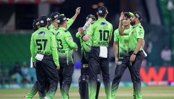 Lahore Qalandars players celebrate claiming a wicket during the PSL 11 match against Multan Sultans at Gaddafi Stadium, Lahore, on April 3, 2026. — PSL