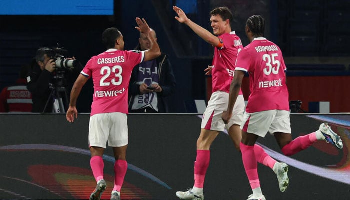 Rasmus Nicolaisen (centre) celebrates after equalising for Toulouse following an error by PSG goalkeeper Matvey Safonov. — AFP