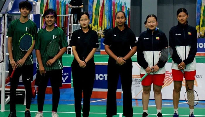Pakistan players (left) and Bhutan players (right) pose with the match referees (centre) after their tie in the Badminton South Asia Regional Championship 2025, held in Bhutan on August 17, 2025. — Reporter/Faizan Lakhani