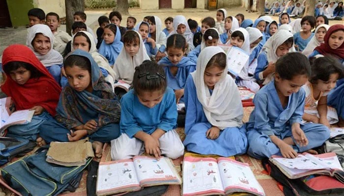 This undated photo shows girls attending a school in Swat. — AFP/File