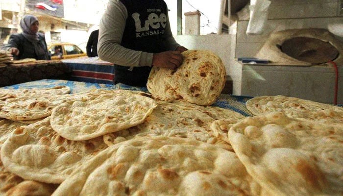 A man prepares roti. — Reuters/Files