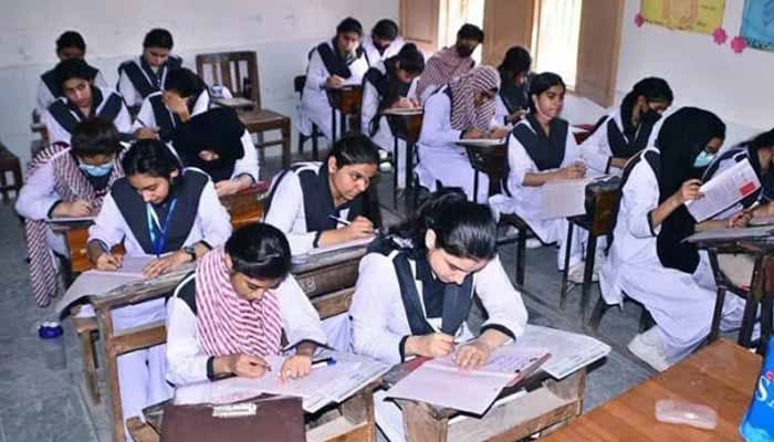 Female students are pictured during annual board exams at a government college. — APP/File