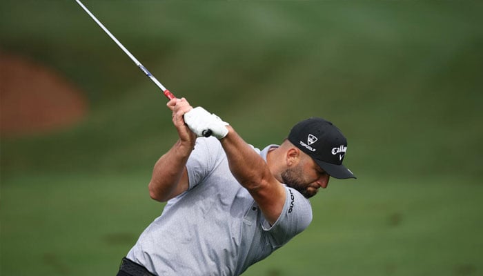 Two-time major winner Jon Rahm of Spain warms up ahead of the 90th Masters. —AFP/File