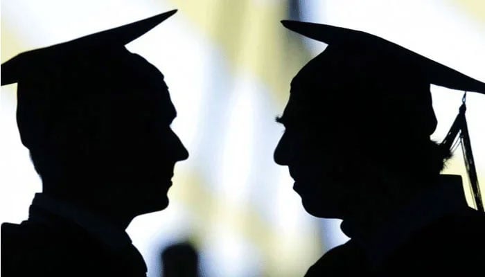 Representational image of students wearing a graduation cap. — AFP/File
