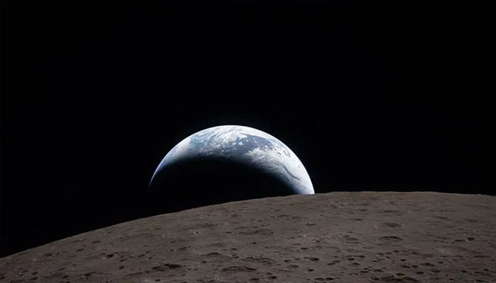 This handout picture released on April 7 by Nasa shows Earth as it dips beyond the lunar horizon, also known as an ‘Earthset’, as seen from the Orion spacecraft on April 6, 2026. — AFP