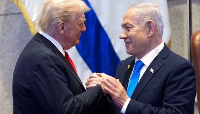 President Donald Trump talks with Israels Prime Minister Benjamin Netanyahu at the Knesset, Monday, Oct. 13, 2025, in Jerusalem. — Reuters