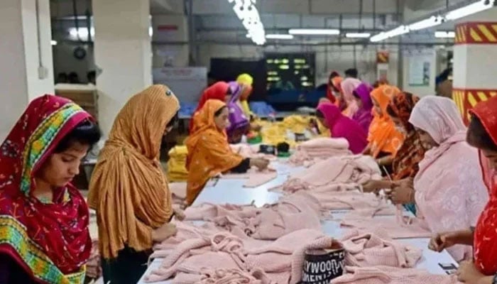 In this photograph women are working at a garment factory. — AFP/File