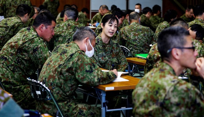 Japan Ground Self-Defence Force (JGSDF) soldiers participate in a seminar to prevent harassment at JGSDF Camp Asaka, in Tokyo, Japan April 16, 2024.—Reuters