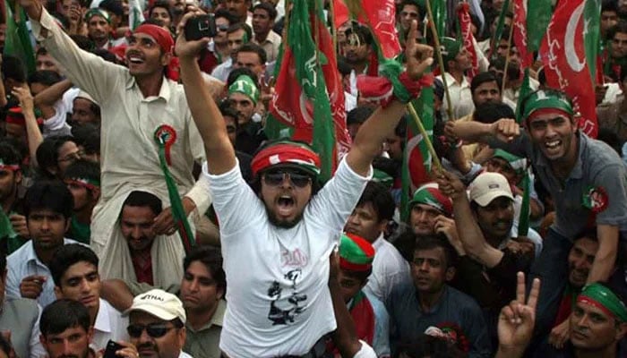 In this 2012 photo, supporters of the Pakistan Tehreek-i-Insaf shouting slogans during a rally. — AFP/File