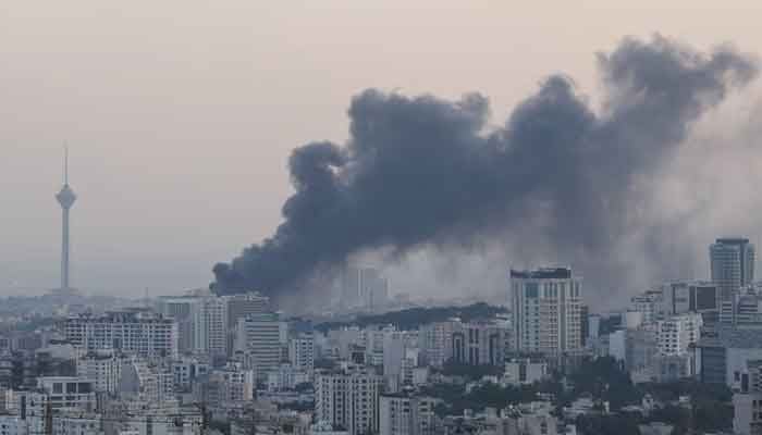 Smoke rises following an Israeli attack on the IRIB building, the countrys state broadcaster, in Tehran, Iran. — Reuters/File